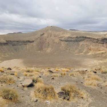 Before heading west to Tonopah, we took a quick detour east to the isolated volcanic region where you can find Lunar Crater.
⠀⠀⠀⠀⠀⠀⠀⠀⠀⠀⠀⠀⠀⠀⠀⠀⠀⠀⠀⠀⠀⠀⠀⠀⠀⠀
It's one of six National Natural Landmarks throughout Nevada. ⠀
⠀⠀⠀⠀⠀⠀⠀⠀⠀⠀⠀⠀⠀⠀⠀⠀⠀⠀⠀⠀⠀⠀⠀⠀⠀⠀⠀⠀⠀⠀⠀⠀⠀
The geological name for this shallow and broad crater is a 